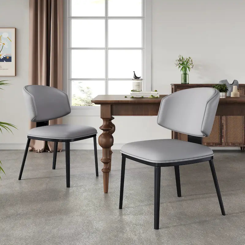 Chaise de salle à manger capitonnée en similicuir avec pieds en métal Blanc Noir