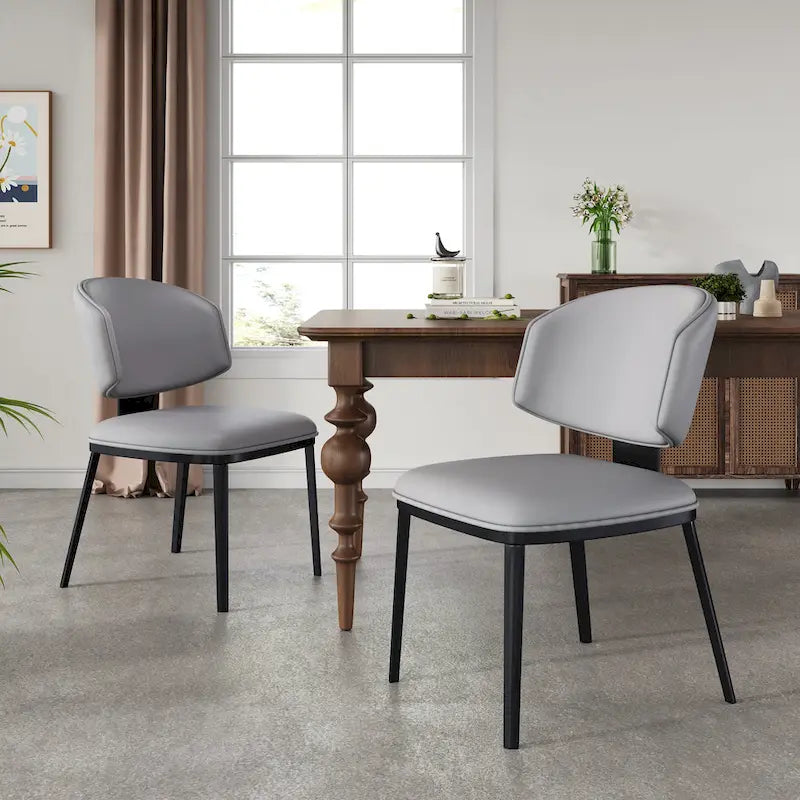 Chaise de salle à manger capitonnée en similicuir avec pieds en métal Blanc Noir