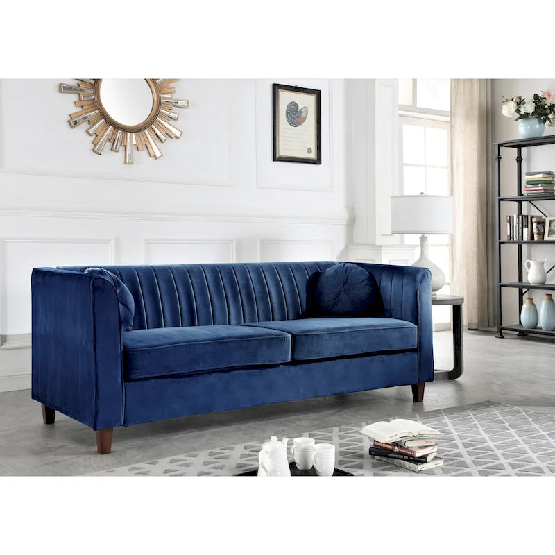 Canapé Chesterfield en velours avec dossier capitonné et coussins cylindriques