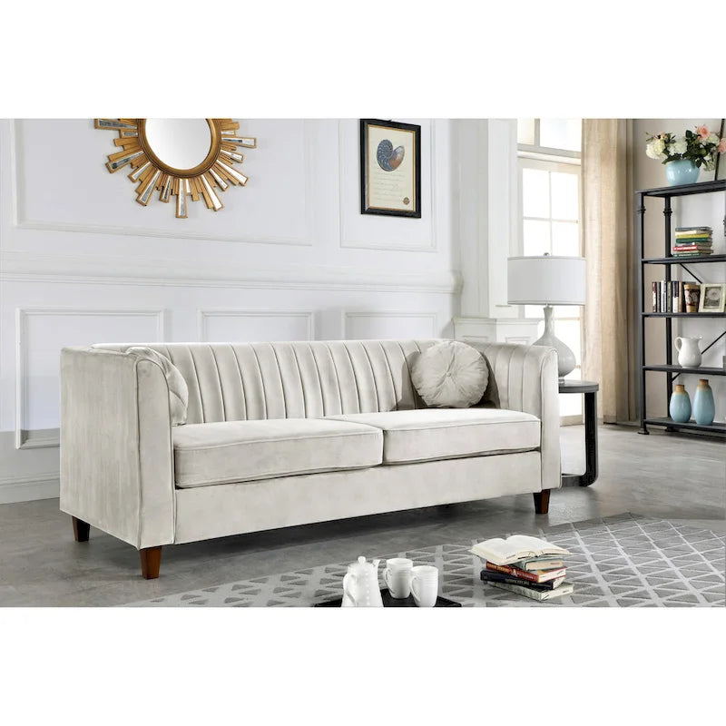 Canapé Chesterfield en velours avec dossier capitonné et coussins cylindriques