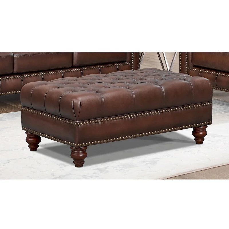 Repose-pieds en cuir pleine fleur capitonné brun caramel avec clous décoratifs